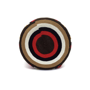 Bottom view of a beautiful Wayuu Mochila Bag with a vibrant pattern in colors Ivory, Bright-Red, Light-Brown, Dark-Brown, and Black.