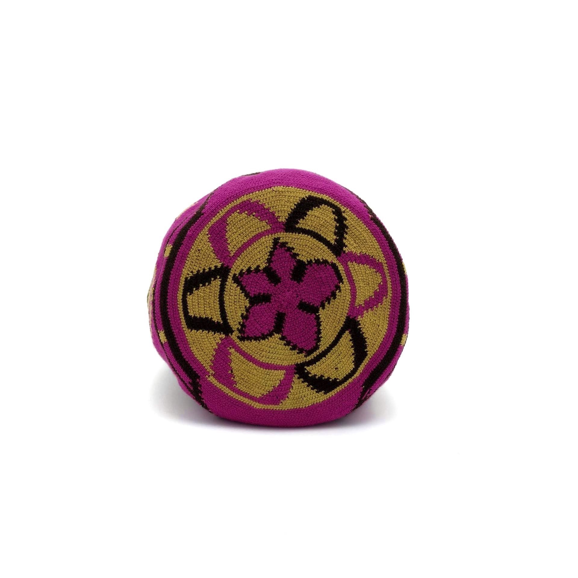 Bottom view of one-Thread Wayuu Mochila Bag with a beautiful pattern in colors: Red-Violet, Light-Brown, and Brown.